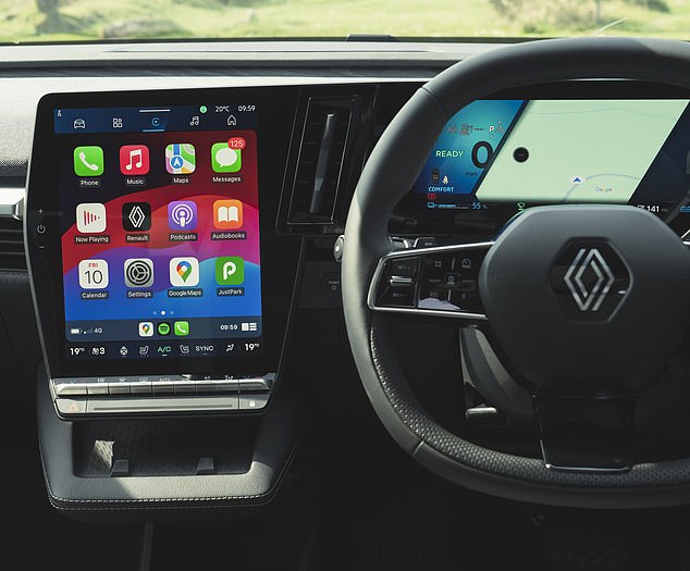 The fabric-covered dashboard has a 12-inch multimedia screen and a 12.3-inch driver display