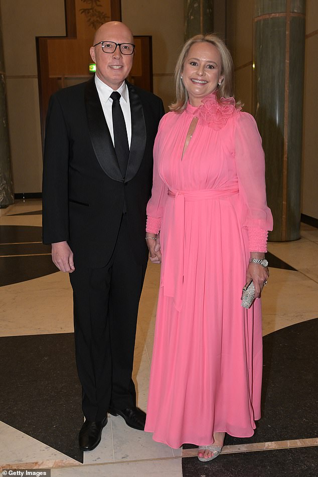 Another advantage of going early for Albo: it would expose the lack of detail on Opposition Leader Peter Dutton's nuclear policy. Above, with his wife Kirilly at the Midwinter Ball last week