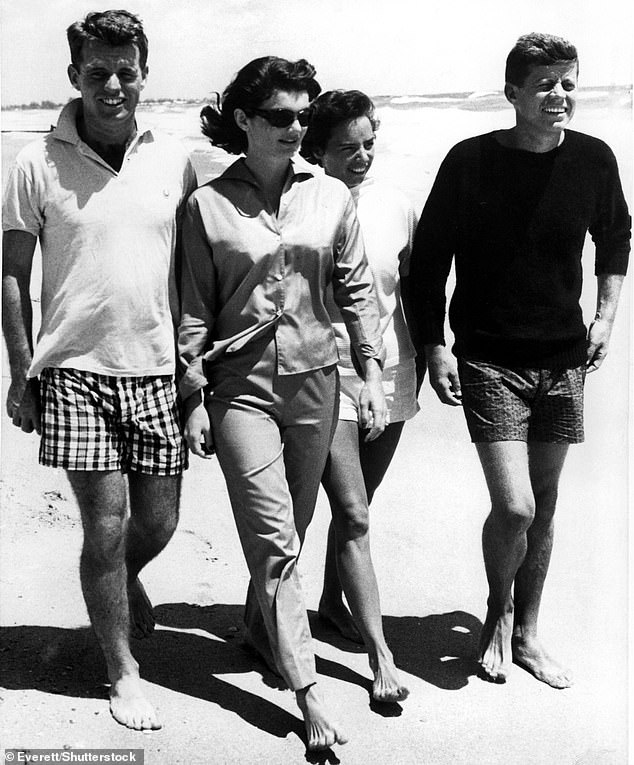 Robert, Jackie, Ethel and John F. Kennedy relax on the beach in Palm Beach in 1957