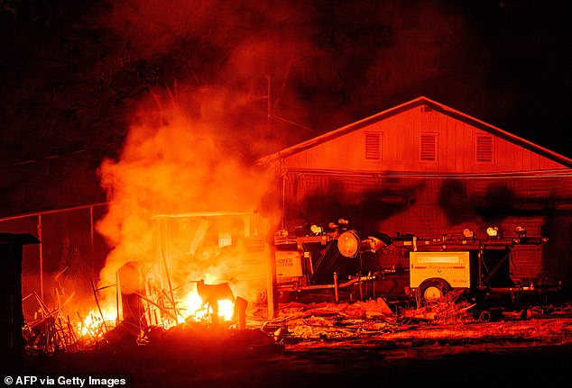 Pictured: The French fire tears through a home in Mariposa County