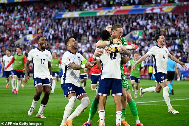 The Three Lions celebrate their victory in the UEFA Euro 2024 quarter-final between England and Switzerland at the Düsseldorf Arena in Düsseldorf today.