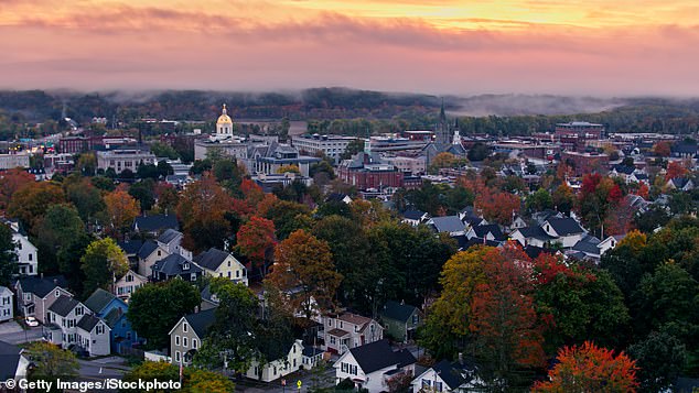 Aerial photos of the New Hampshire State House in Concord at sunrise on a foggy morning