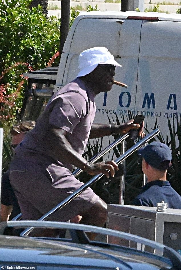 Michael Jordan Smokes A Cigar As He Heads Out For Dinner In Barcelona ...