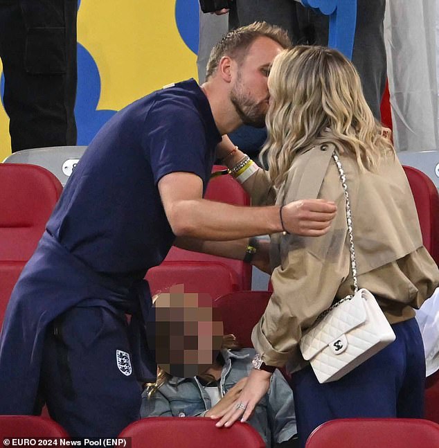 Other players and their partners hugged each other lovingly and shared a kiss (pictured Harry Kane and his wife Katie)