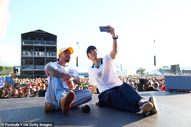 Hamilton and Russell posed for a selfie in front of thousands of fans after England's victory