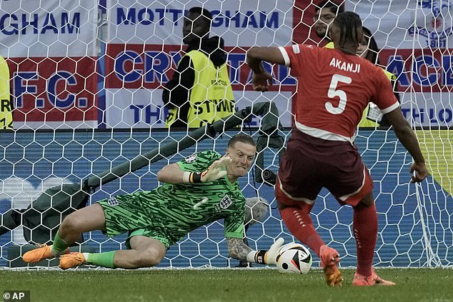 England won 5-3 on penalties, with Jordan Pickford saving Manuel Akanji's spot-kick