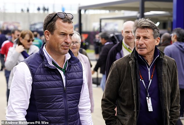 Princess Anne's son dressed for the unpredictable British summer weather, wearing a light button-down shirt, waterproof waistcoat and sunglasses