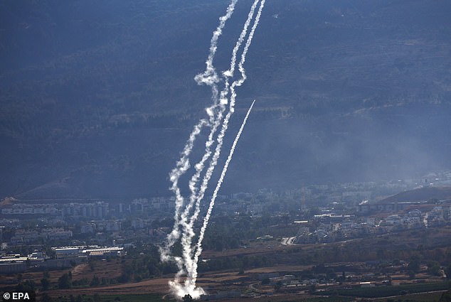 Whoever wins in November, the world is uncertain. Here, Israel's Iron Dome is seen intercepting a rocket fired from southern Lebanon.