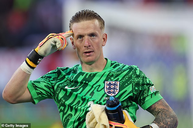 The Everton goalkeeper's hair looked noticeably different to what he normally wears on the football field