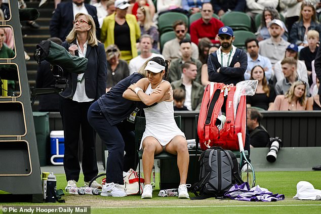 She received attention for her back (pictured), but she was still able to complete the race