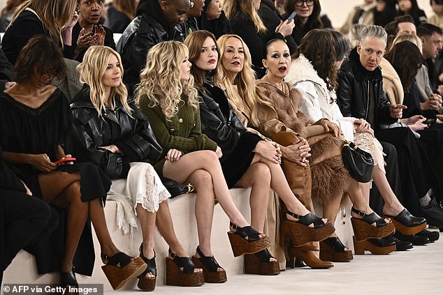 Nearly the entire front row of Chloe's Fall/Winter 2024 runway show wore the brand's high-top, black leather open-toe sandals