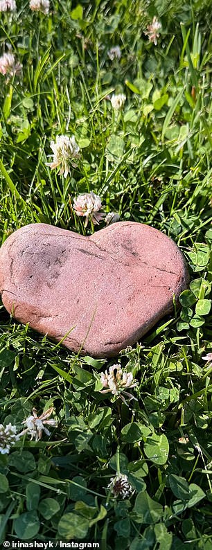 The model found a red rock in the shape of a heart