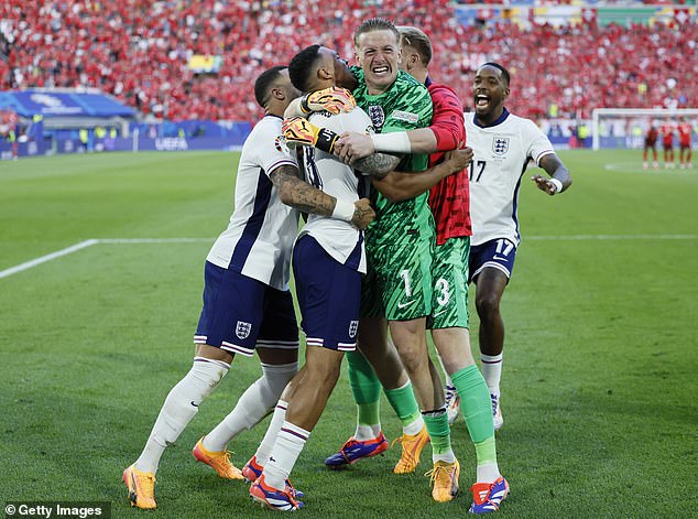 Pickford was mobbed by his teammates after England's penalty win in Dusseldorf