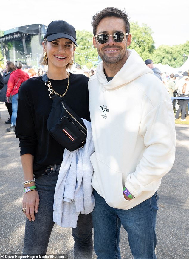 The couple cut a casual figure at the event, flashing broad smiles