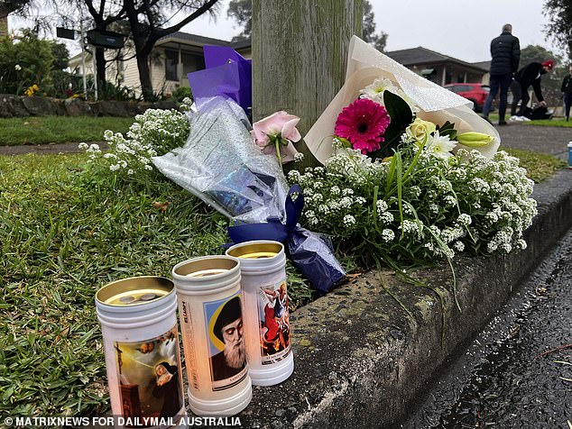 Neighbors and family friends laid flowers for the three children who died on Sunday