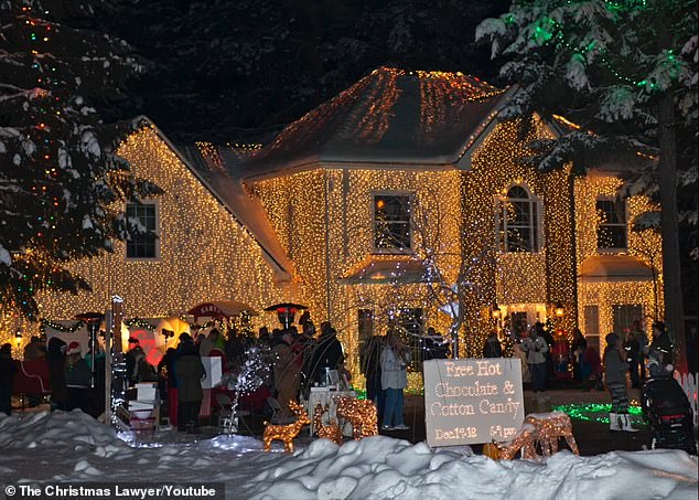 Thousands of people came to watch the bright spectacle of 200,000 lights, along with costumed characters, musicians and a children's choir