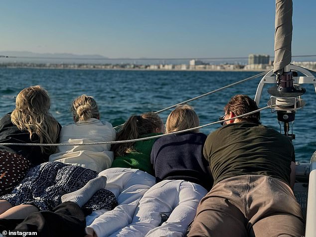 The former couple, who were married from 2001 to 2013, laid down with their daughters to enjoy the incredible view