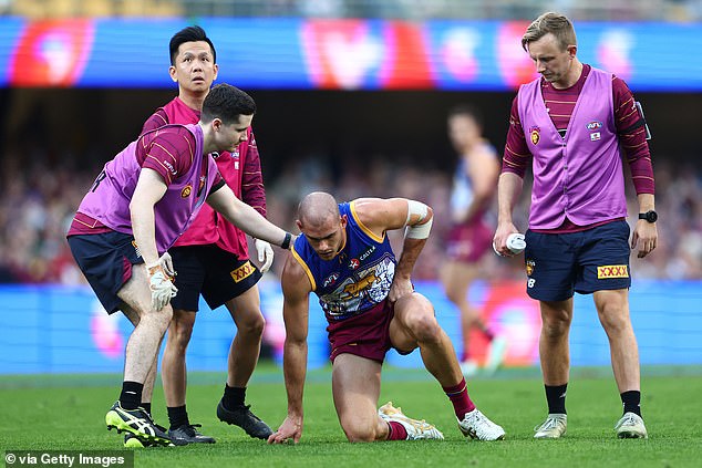 Starcevich struggles to his feet after Rankine's blow, which could cost both players time on the field