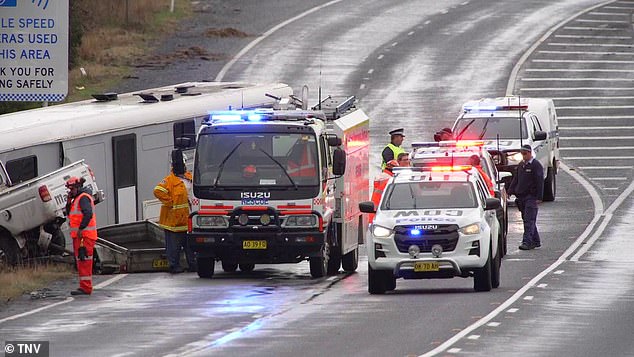 The Mid-Western Highway is closed to heavy traffic between Mandurama and Blayney as police (pictured at the scene) investigate the collision