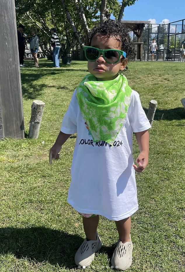 The reality star also shared a photo of Tatum wearing a white T-shirt to the event with a bright green bandana around his neck and green sunglasses on his face.