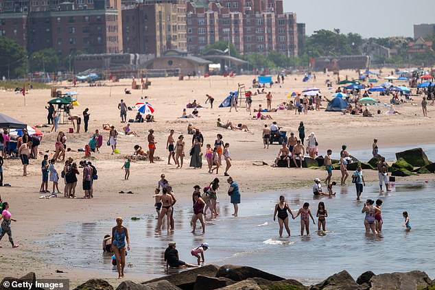 Globally, June 2024 was the warmest June since at least 1940, when the EU department began keeping records. People pictured cool off at Coney Island on a balmy afternoon on the first day of summer on June 20, 2024 in New York City