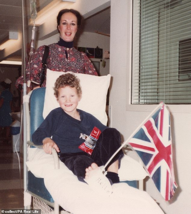 Patriotic Hamish, with a Union Flag on his hospital bed. He underwent 16 months of 'brutal' cancer treatment at Great Ormond Street Hospital after being diagnosed at the age of five