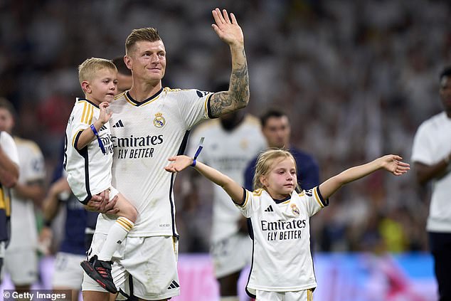 Kroos said that as his seven-year-old daughter (pictured with her father in May) gets older, he would rather have her have a night out in Spain than in his home country.