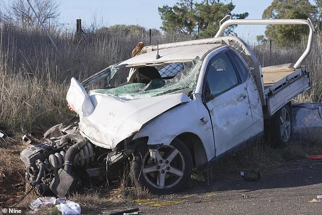 The mother of three was killed instantly when her green sedan collided with a pickup truck (pictured) being driven erratically by her estranged husband Troy Armstrong while driving home from school