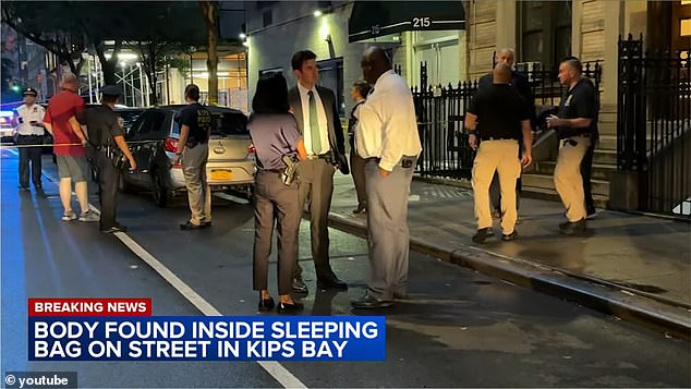 A shocked woman came across a human body wrapped in a garbage bag on a New York City sidewalk on Saturday, officers revealed.