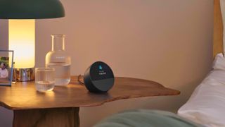 Amazon Echo Spot on a bedside table