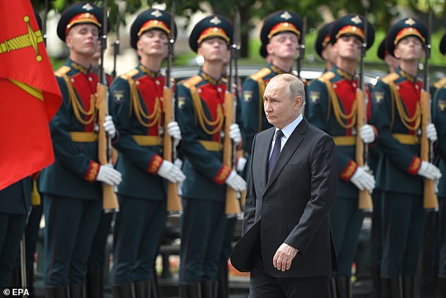 According to Stockholm, the threshold for Russia to use military power is 'low'. Pictured: Putin with troops in Moscow last month