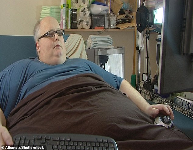 Paul, who rose to fame on the TLC series World's Fattest Man, said at his worst he pulled out his own teeth because they were crumbling from his diet of 40 chocolate bars a day (pictured from 2009)