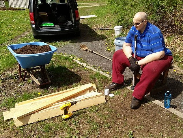 He can't walk, so to get around he uses an extra-wide electric wheelchair and he's even taken up a new hobby: gardening (photo from 2017)