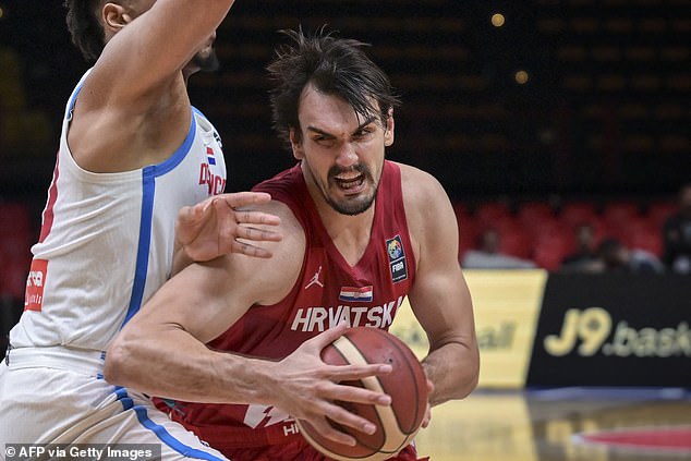 Nuggets forward Saric was seen in a chokehold with another man during the incident