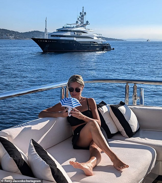 She also shared a photo of herself relaxing on the lounge sofa as she traveled from St. Tropez to Cannes