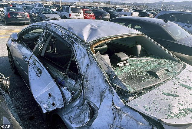 The 256-pound wheel crushed cars where it landed after falling from the plane to the ground