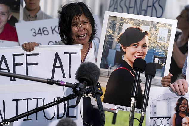 Clariss Moore, the parent of Danielle, one of the victims of the Boeing 737 Max 8 crash in Ethiopia, holds her photo during a press conference on Capitol Hill last month