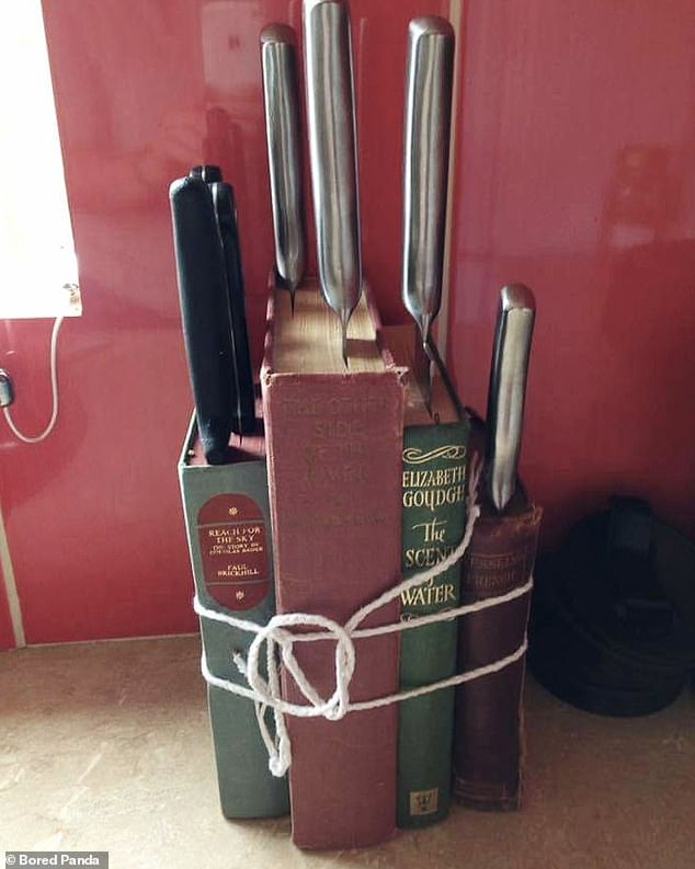 Confused! Another book lover decided to use some old books as a knife block in their kitchen