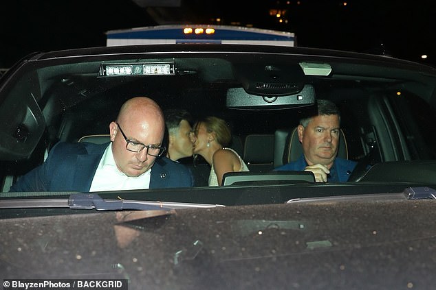 Johansson, 39, and Jost, 42, shared a very passionate kiss in the backseat of a car before arriving at the star-studded event