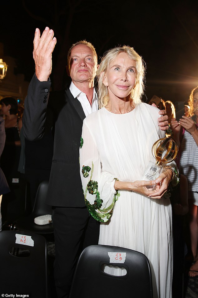 Sting and Trudie were in a cheerful mood as they proudly posed with the award