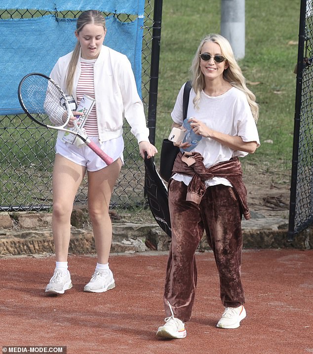 The radio queen enjoyed a game of tennis with her daughter Kitty (left) on Tuesday