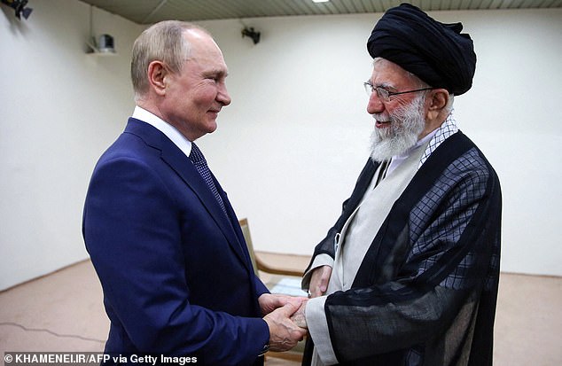 The office of Iranian Supreme Leader Ayatollah Ali Khamenei shows him (R) as he receives Russian President Vladimir Putin in Tehran, on July 19, 2022