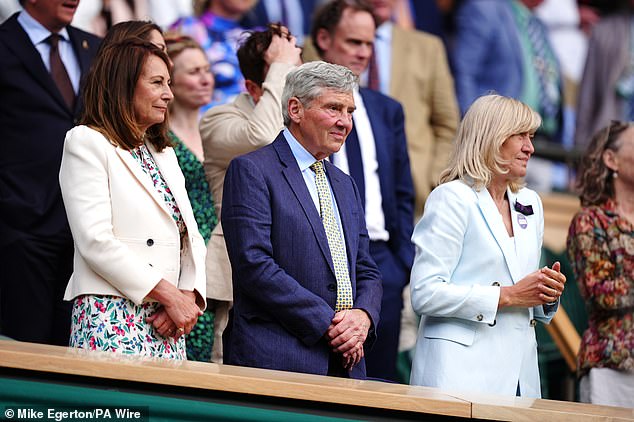 July 4, 2024 -- Kate's parents Carole and Michael Middleton in the Royal Box for the Wimbledon Championships last week alongside All England Club president Debbie Jevans (right)