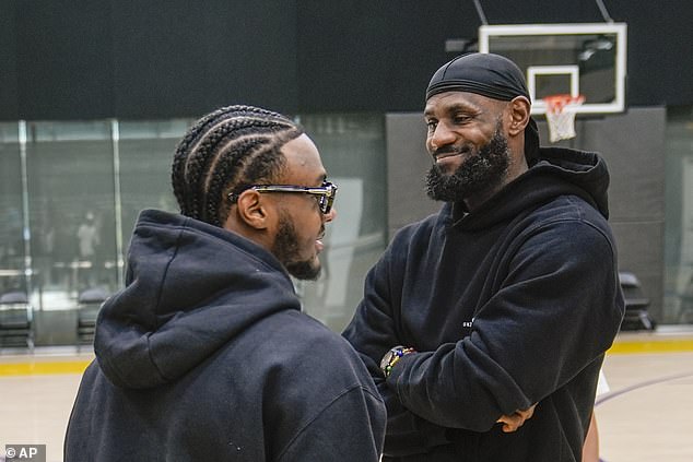 LeBron has signed a new $104 million deal in LA after his son Bronny (left) joined him