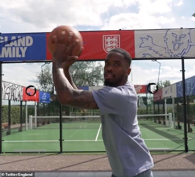 Toney makes a no-look basketball shot that mimics his no-look penalty against Switzerland