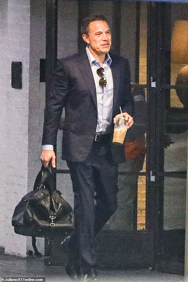 After parking his vehicle, Ben walked across the parking lot, wearing leather shoes and carrying a black bag