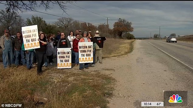 Above, locals are seen protesting the Bitcoin mine. Local officials say they can only fine the mine for noise pollution