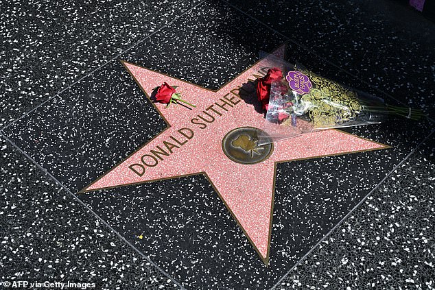 Fans laid flowers on the actor's star on the Hollywood Walk of Fame after his death