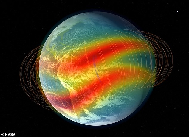 Near the Earth's magnetic equator, charged particles are guided up and out along magnetic field lines, creating two dense bands of particles north and south of the equator that scientists call 