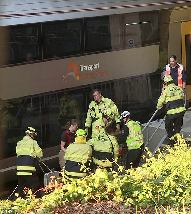 Fire and rescue workers had to carefully free the woman from the train on Tuesday afternoon